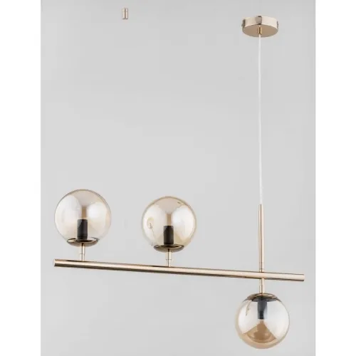 Nowoczesna lampa wisząca złota pozioma rurka z bursztynowymi kloszami Palermo Alfa 63038 3xE14 92cm x 71cm Ostatnia szansa